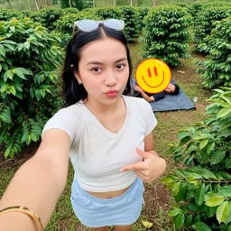 Young woman in the bushes and swamp